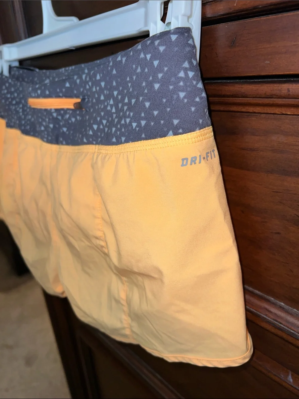 Nike Women's Orange Running Shorts with Gray Patterned Waistband